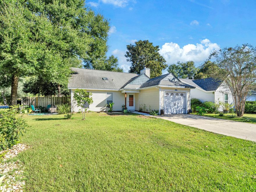 Fantastic corner lot in Blue Pine Village, your search for an affordable home in Bluewater Bay has ended. This cute cottage has YOU written all over it! Open floorplan w/ vaulted ceilings, wood burning fireplace, backed with wainscoting for a beautiful accent wall. Updated kitchen (all smart appliances) , and master bathroom, master & guest bedroom on main floor with third bedroom (with two closets) on the 2nd floor. Brand NEW HVAC , large fenced back yard and an attached garage. Owners are able to enjoy the two Blue Pine community pools and rent the boat & RV storage - Bluewater Elementary School is just down the road,  grocery store, restaurants & shopping around the corner or pop over the midway bridge to walk on the beach or dip your toes in the clear Gulf waters.