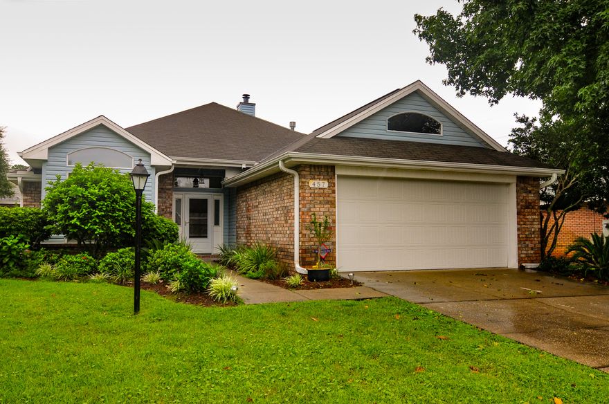 Beautiful Contemporary home in desirable Magnolia Shores Subdivision. This 3 bedroom  two full bath home has so much to offer. Turn key and ready to go, 457 Sandmore Shores provides waterviews from the front yard of the Santa Rosa Sound. Quiet street that ends in a cul-de-sac. Within 4 miles west of Hurlburt Field Air Force Base. Close to beaches and shopping. Newly painted, new carpet, new matching appliances. The entry foyer overlooks a vaulted ceiling with a great open floor plan. There is a gas fireplace for those cool winter mornings. The master bedroom is split from the other two guest bedrooms. The master bath has a separate garden tub and shower with double vanities. Lots of storage closets throughout this great property. Spacious granite counter tops in the kitchen with large stainless steel fridge, dishwasher, stove with smooth top cooking surface and built in microwave. Custom tile backsplash in the kitchen as well gives the home an elegant touch. There is a new gas water heater, there is a newer HVAC system with electric A/C and gas heat. Security system all ready in place and ready to activate. Easy care exterior with irrigation system, brick and vinyl exterior allows more time to enjoy the nice sized back yard that is privacy fenced and has a large covered patio. Two car garage with pull down stairs for storage above. This is one that needs to be on the top of your list. Schedule your showing today! Buyer to verify all data and dimensions.