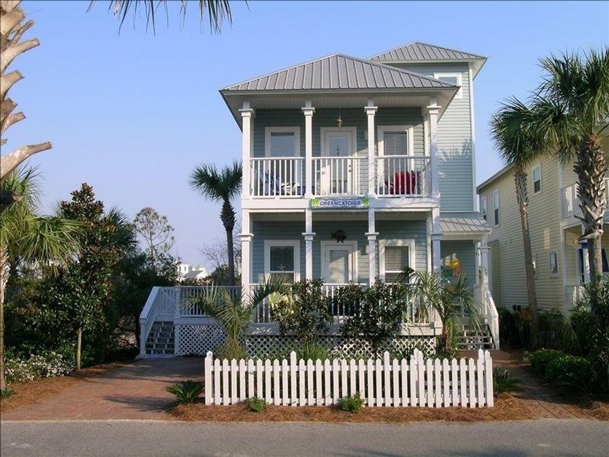 This charming home on the SOUTH side of 30A has been lovingly cared for by the original owners and has so much to offer. One of the largest homes in the neighborhood with 4 full bedrooms plus a tower with beautiful gulf views. The home borders a common area on 2 sides which gives the property added privacy. You will love spending time on the large side deck which is a perfect place for outdoor dining, lounging and sunning. This light and bright home has an open floor plan and offers a full bedroom and bath as well as the main living area on the first floor. Just a few of the special features include: granite counter tops, upgraded cabinetry, a large storage area beneath the deck, 3 covered porches, wood flooring and a new a/c unit. Old Florida Cottages is a quaint neighborhood with