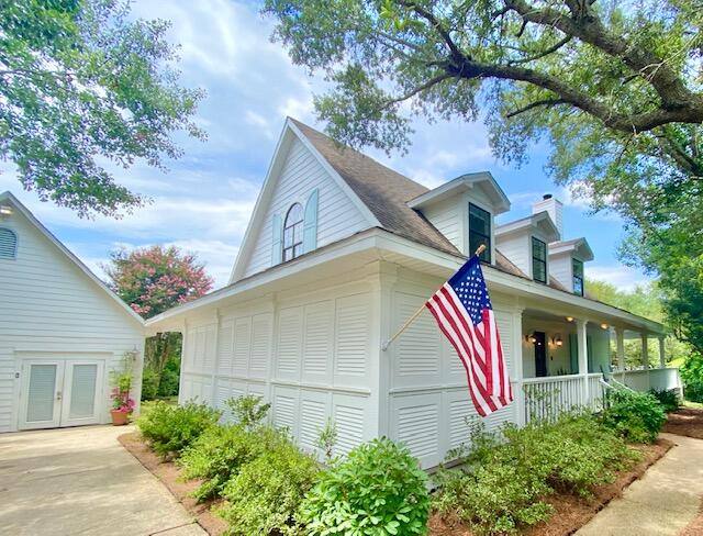 BEACHSIDE community of Gulf Pines. 1400' of private, gated beach. Short term rentals allowed. Property is 2 lots combined into single parcel (see survey). Can be split, and goes completely around Horseshoe curve, voluntary HOA $300 annually, 3 bed/3.5 bath with almost 750 sf heat/cool game/storage building that can be converted to add 2 bed/2 bath combo. Plenty of parking.Room for 14x28 saltwater pool behind home that would not encumber the additional lot. Twisted, mature native oaks and magnolias, lush perimeter of natural vegetation gives privacy. American cherry floors throughout as well as custom cabinetry including a wine stock with antique iron doors, glass front storage with pull out linen baskets woven from cherry tree wood, and a copper top island.