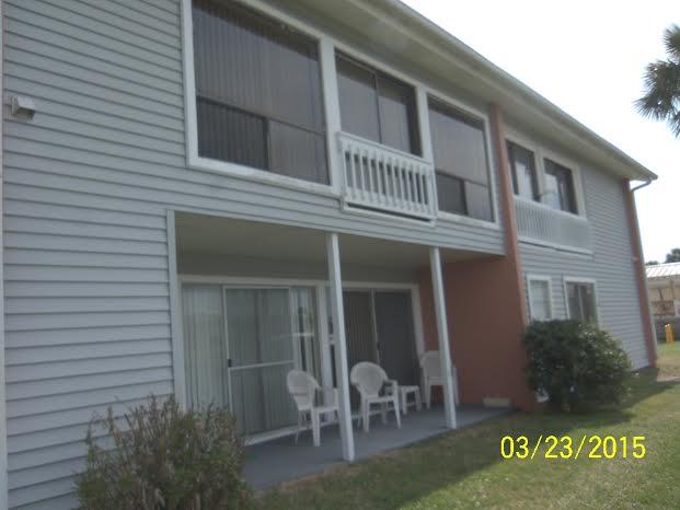 REO Listing. Move in ready condo across from the beach. New carpet. Interior freshly painted. New appliances. Lake view. Located next to pool and postal boxes. Development has multiple pools, tennis courts and a community center. Great investment potential. DON'T WAIT...YOU'LL BE TOO LATE!!!