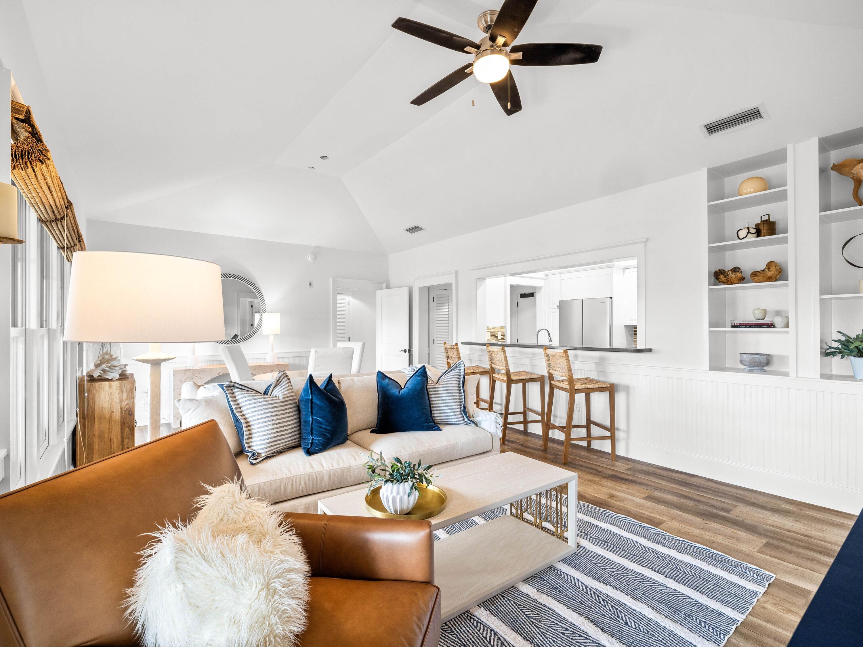 Perched on the third floor in the heart of WaterColor Town Center, this exceptional condo offers a premier location with a front-row view of the iconic fountain and a peek of the gulf from its expansive covered porch. Just 200 yards from the WaterColor Beach Club, this residence provides the perfect balance of vibrant town activity and private retreat, allowing owners to soak in the energy of the community while remaining above the bustle. Recently refreshed with new LVL hardwood floors and freshly painted walls and ceilings, this unit is move-in ready for a primary residence, second home or high-performing vacation rental, though it is not currently on a rental program. The secure building entry ensures privacy, with an elevator indoors providing effortless access. The secure building entry ensures privacy, with an elevator indoors providing effortless access only five exclusive residences on the entire floor, this condo offers a rare opportunity to own a private sanctuary in one of WaterColor's most coveted settings. Residents enjoy access to an impressive array of amenities, including nine resort-style pools, 35 miles of scenic hiking trails, stand-up paddleboard rentals, and pickleball and tennis courts. Located just steps from Wine World and Beach Happy, this property offers effortless access to WaterColor's finest dining and entertainment. With two dedicated parking spaces and a prime town-center setting, this condo delivers an unmatched lifestyle on 30A.
