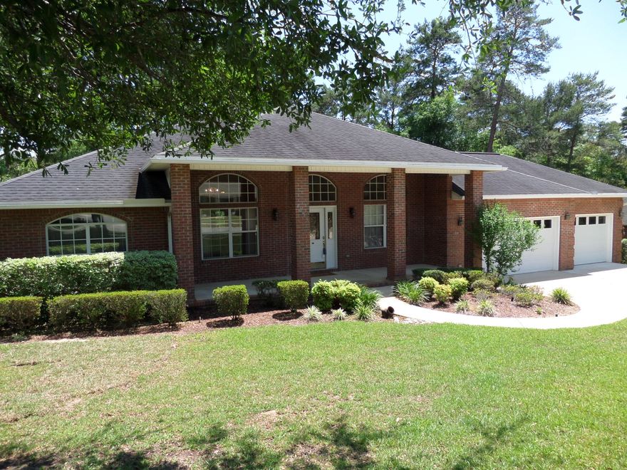 Executive home in Rocky Bayou Estates features 4 bedroom, three bath, 3 car garage and is a floor plan easy to love. The bonus room overlooks a beautifully wooded back yard with a spacious deck. Another wonderful space for outdoor living and entertaining. Gas outlet for your grill is already plumbed, making it just foot steps away from the kitchen. Kitchen has new granite countertops, new sink, faucet, along with new hardware on the cabinets and drawers.The interior architecture of this home provides perfect detail for streaming sunlight throughout the most of the day.