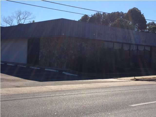 Flex Bldg. with about 8,000 square feet. Property is situated just across the street from the US Post Office. Perfect for a tenant who needs easy access to the Post Office. Ground level roll up door, property is in the HUB ZONE