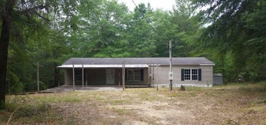 Real Estate Owned REO. Need to get away to the country? Here is a 1999 3 bedroom 2 bath double wide mobile home. This home sits on 9 acres, right off paved road. It also has a large covered porch on the front. Come and enjoy the peace and quiet of the country life. Call to take a look today at 701 Sexton Rd.