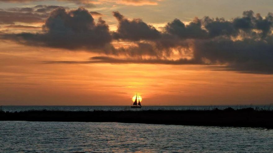 Waterfront home on a VERY private lot with SPECTACULAR sunset views in the gated community of Southwind of Bluewater Bay. This custom built Barton Home was designed to capture amazing bayou, bay and golfcourse views from almost every room in the house. The floorplan was thoughtfully designed to flow through both formal and informal living areas while still capturing the views from an abundance of tall glass windows and doors. The covered back patio and 800sf deck along the rear of the home is the perfect place to enjoy the magnificent sunsets or watch the dolphins, pelicans and ospreys fish and play in Grass Lake Bayou. Enjoy fishing from the end of your dock or take your boat out on the bay for the daythe choice is yours! CLICK ON MORE FOR ADDITIONAL INFORMATION ABOUT THIS H