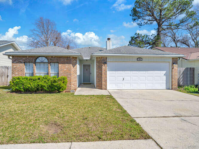 HANDYMAN SPECIAL ... INVESTORS DREAM! Ideally located near elementary, middle, and high schools, making it a great option for families with school-aged children. There are sidewalks throughout the neighborhood offering a stroll or bike ride to nearby amenities. This property is also convenient to Hurlburt Field, Eglin Air Force Base and Duke Field. along with dining, shopping, waterfront park and beaches. Inside, you'll find three bedrooms with walk-in closets, two bathrooms, interior laundry and a large living room providing ample space for both relaxation and privacy. The cozy fireplace adds a touch of warmth and ambiance. A one-car garage offers convenience and additional storage options. The privacy-fenced backyard offers a serene and secluded outdoor space.