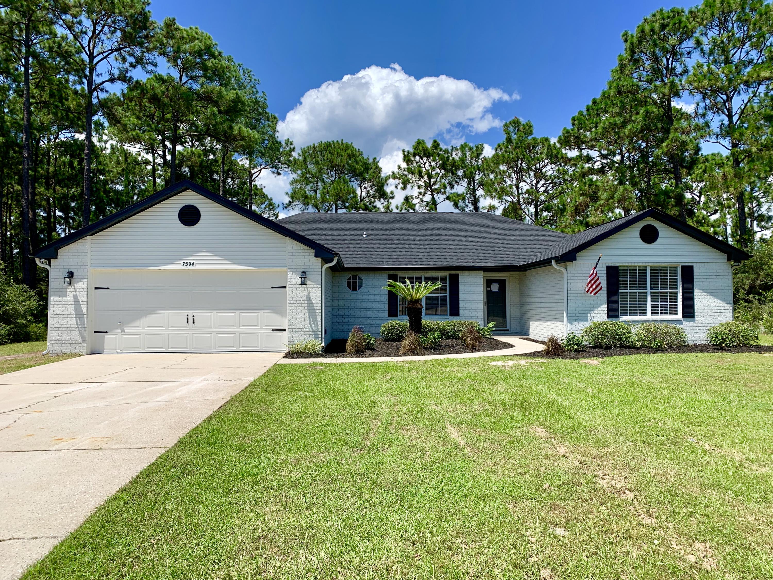 Completely remodeled 4/2 on over half acre lot--new roof and ac and all updated through out- wont last --Club House amenities include: Pools, Gym,Tennis Courts,Waterfront Park & Deeded Access to Santa Rosa Sound!