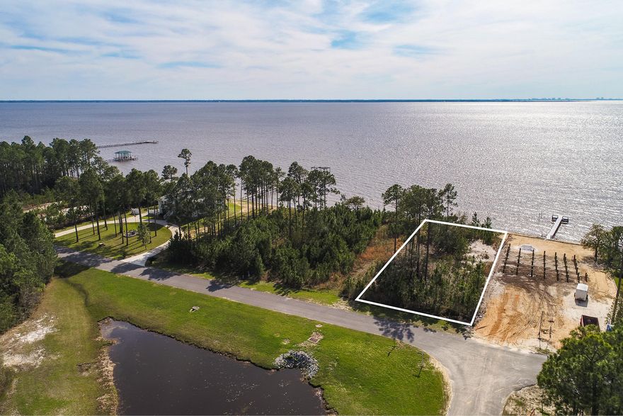 Enjoy expansive water front views from this beautiful lot with 80' of bay frontage in Bay Harbour subdivision. Relax in the serenity of living on the North side of the Bay in Freeport and have quick access to all the beach activities just across the bridge. Don't miss this opportunity to own your own bay front lot before pricing follows the price escalations South of the bay. Low homeowner fees and no build out time.