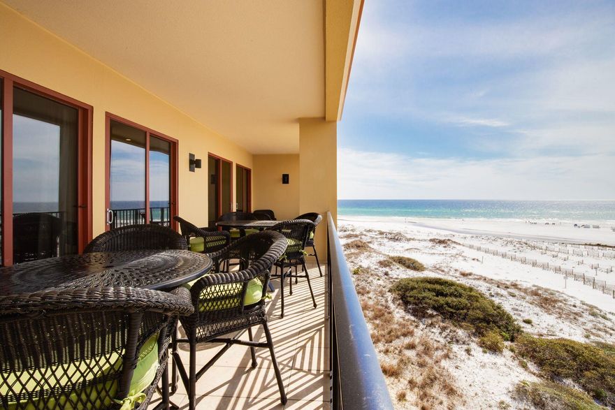 One of the best views in Blue Mountain Beach can be enjoyed from this top floor five-bedroom, four and one half bath condo. The breathtaking setting with panoramic lake, gulf and beach vistas is matched by a residence filled with high-end fixtures, luxury Restoration Hardware furnishings and custom features. From the richly toned travertine flooring to the custom recessed lighting, nothing has been compromised when it comes to quality. Added closets in the foyer and an owner's closet in the southwest bedroom provide extra space while a new larger water heater and upgraded bathroom ventilation ensure the utmost comfort. The large bespoke kitchen is defined by an angled breakfast bar topped with black granite.
