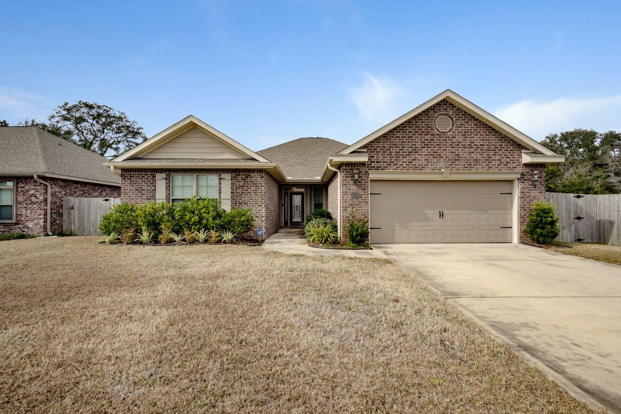 Stunning timeless beauty! This 4 bedroom/ 2 bath home features beautiful dark wood floors complemented by wood cabinetry and granite counters. Open floor plan flows smoothly from the living room to the dining and kitchen. From the moment you walk in, you know this home is quality with the lighted double tray ceilings in the living room, 7 inch crown molding, and oversized baseboards. 42 inch wood cabinets in the kitchen with under cabinet lighting and plenty of counter space will satisfy the pickiest of chefs. The master bedroom is a dream! It also features a tray ceiling with glow lights, a huge walk in closet, and ensuite bath. It also has ''quiet zone'' insulation between the bedroom and living room. Both bathrooms have dual sink vanities. have dual sink granite top vanities. Cont...