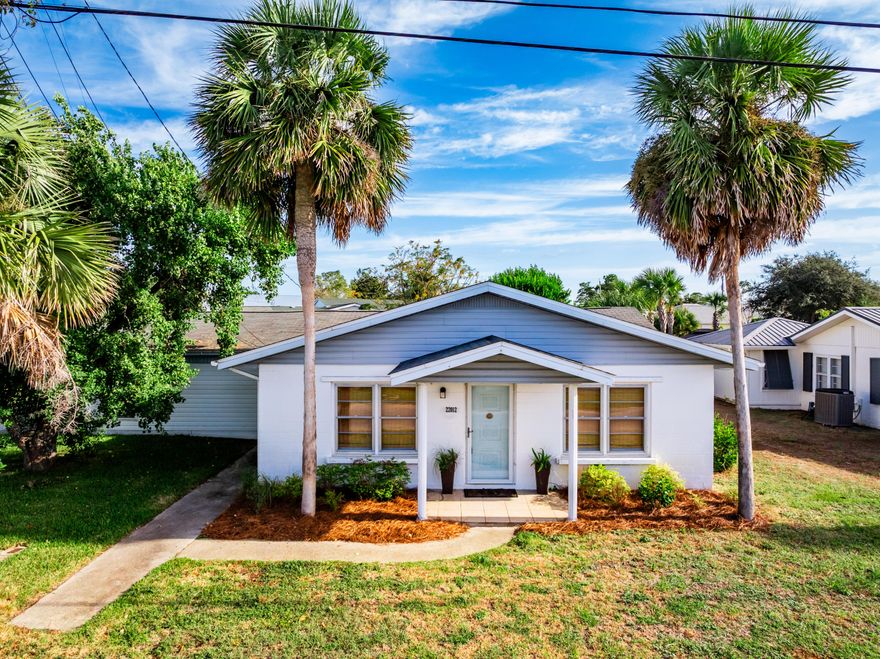 This charming Kiska Beach gem is loaded with Old Florida character and is tucked along the quiet west end of Panama City Beach. Just a short walk or golf cart ride to the sugar-white sand and emerald waters, this laid-back area offers low-density beaches, local character, and a slower coastal pace that offers lots of charm. Step inside to the bright, open living room that anchors the home and is filled with natural light and lovely coastal textures. The home's interior features a blend of updated comfort and vintage personality from its crisp white walls and bamboo shades to its natural wood accents and colorful coastal decor. Each bedroom is thoughtfully designed and features its own unique style, and offers a cozy, inviting space for restful retreats after sun-soaked beach days. There's also a versatile bonus space with wood paneling that could serve as a game room, bunk room, or creative studio.Out back, the private courtyard feels like a hidden retreat with a small refreshing pool, pergola, and plenty of space for lounging or entertaining after a day at the beach. If you're looking for a vacation home, income-producing property, or coastal cottage getaway, 22012 Bataan Ave captures the nostalgic beauty of Old Florida living. Come check it out!

