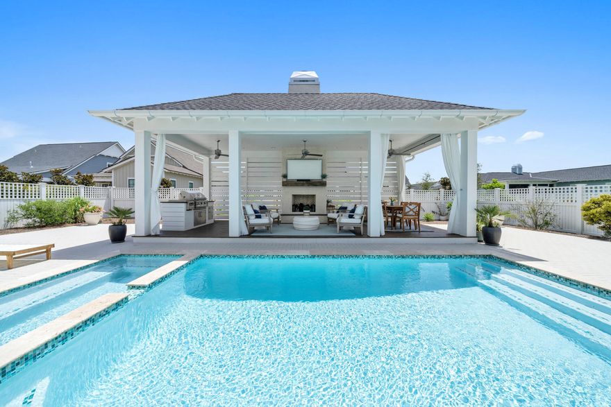 This Custom Duxbury Plan ''A'' designed house by Romair Construction has 4 Bedrooms 4.5 baths and a two car garage. Large heated private pool plus a large spa and a beautiful summer kitchen with pavilion with fireplace, extended pavers, upgraded appliance package, upgraded lighting.6.5 high fence around the back yard for privacy.Main house offers large screen porch .Extensive wooden closet shelving and the well landscaped property.Attic storage in the garage. Upgraded gutter system.