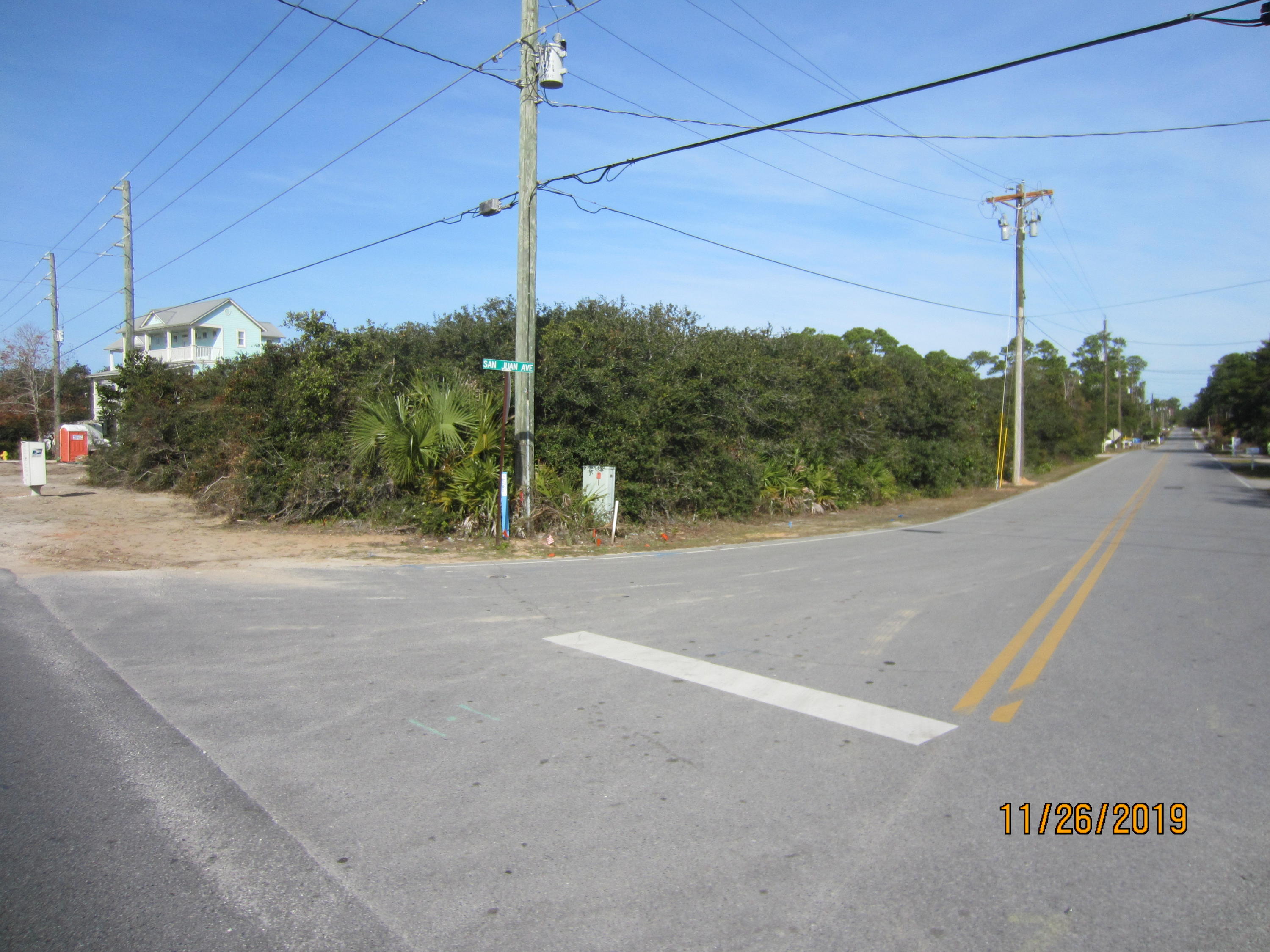 SEAGROVE BEACH..... located on the corner of 30A & San Juan. Less than 400 feet from the beach with views of the Gulf of Mexico from this prime site. All utilities are available. Elevation above sea level approximately 31 feet. Property is ''high & dry''. Located in Gulf Shore Manor with no mandatory HOA fees . Three beach accesses within a few feet. This beach area has a dedicated lifeguard in season with handicap facilities, bathrooms, and special wheelchair for the handicapped. The Town of Seaside is approximately one mile to the West, and there are numerous bike and hiking trails throughout the area. Great property for development with tremendous potential. 85 feet of frontage on 30A. One of the few properties left with frontage on 30A this close to the BEACH.
