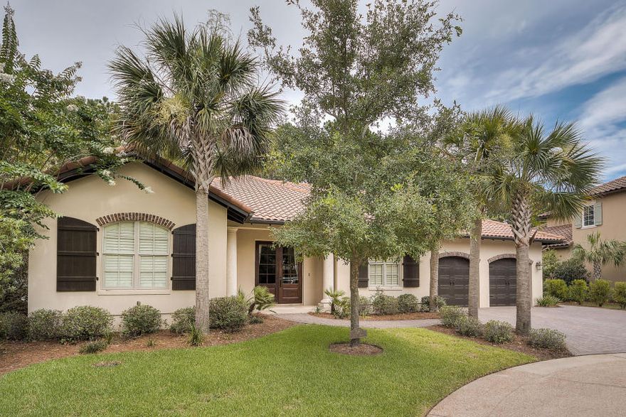 REDUCED FROM $925,000 FOR QUICK SALE: Huff built custom single story home with open floor plan complements today's modern living. The master bedroom and each of the two large additional bedrooms offer en suite baths and large walk-in closets. The office with a built-in desk is part of the master suite. You'll love to cook in the beautiful kitchen with custom cabinets, Bosch and Jennaire appliances, gas range, granite countertops and island with breakfast bar. The living room gas fireplace is a focal point and the built-in whole house and exterior stereo system adds to your entertainment pleasure. The large laundry room includes custom cabinets, utility sink and built-in desk. The screened lanai with beautiful golf course views is home to the outdoor summer kitche