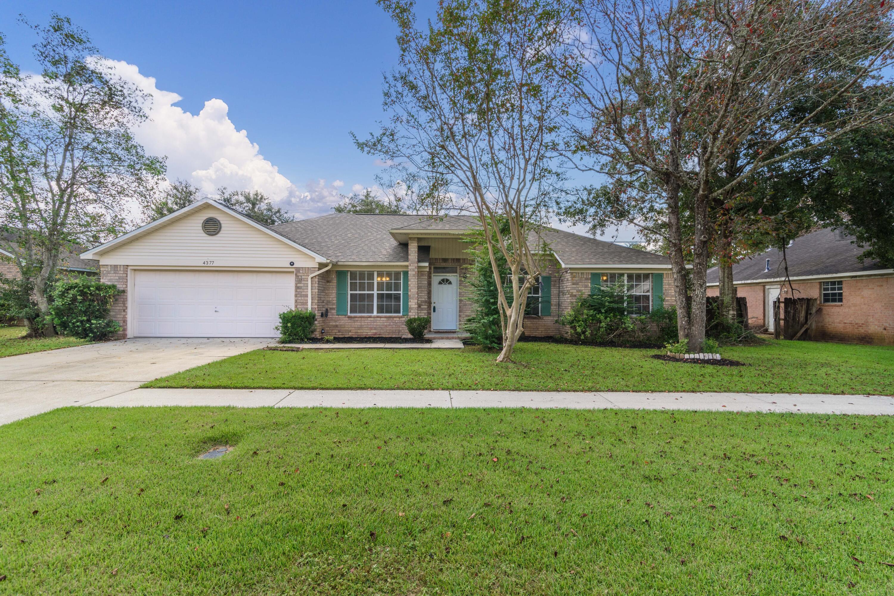Conveniently located in the community of Bayou Ridge, this home offers gorgeous tile throughout the entire home, 2 living spaces, formal dining room and a new roof (year old). The second living space would make for a great home office, gym or playroom. Freshly painted with a neutral color choice including doors and all trim, you'll also enjoy the vaulted ceilings offering a nice spacious feel and a wood burning fireplace in the living room. The kitchen comes equipped with a breakfast bar, spacious breakfast nook, electric cooktop and fridge with ice and water dispenser. The primary suite located just off the kitchen, is suitable for a King-size bed and has a large walk-in closet and tray ceiling. The bathroom has a double vanity with a built-in makeup dressing area, garden tub and separate