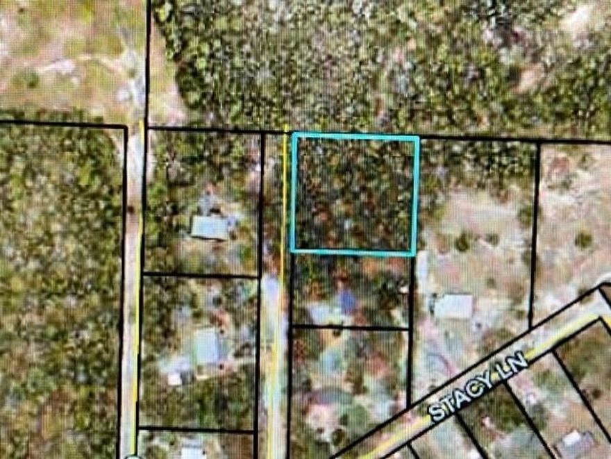 Build your home on this private lot tucked away in north Crestview! Large 1.53 acre wooded lot ready for you to clear and build your dream home. This location is tucked away on Stacy Lane just off of Old Bethel in north Crestview.
