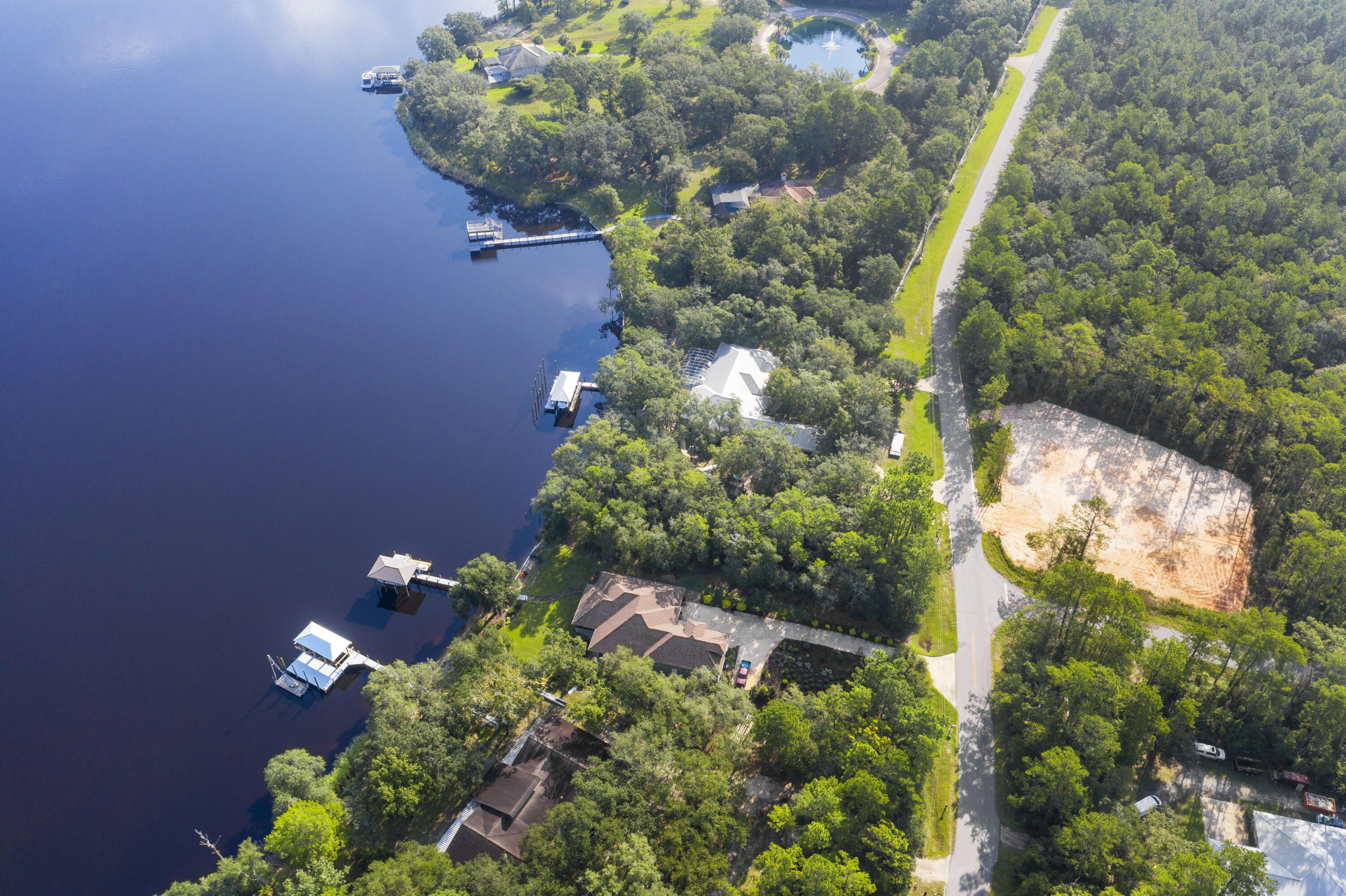 One of the last lots available on Lagrange Bayou with sunset views. This half acre property is covered with large trees and 87.96 Feet of waterfront. With breathtaking views and unobstructed views it is perfect for your waterfront dream home and a great way to enjoy water activities like boating, fishing, kayaking, personal watercraft or just a stroll in this protected bayou. Marina located 5 minutes away from property for gas, snacks, ice, and more. Grocery store and restaurants are within minutes from property