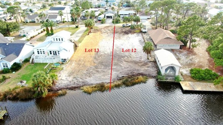 Lot 13 Cleared, Leveled & Graded Ready to Build your new home on this wonderful .24 acres PCB Lagoon Water Front Lot, Bring your Builder! Lot 12 is listed separately.