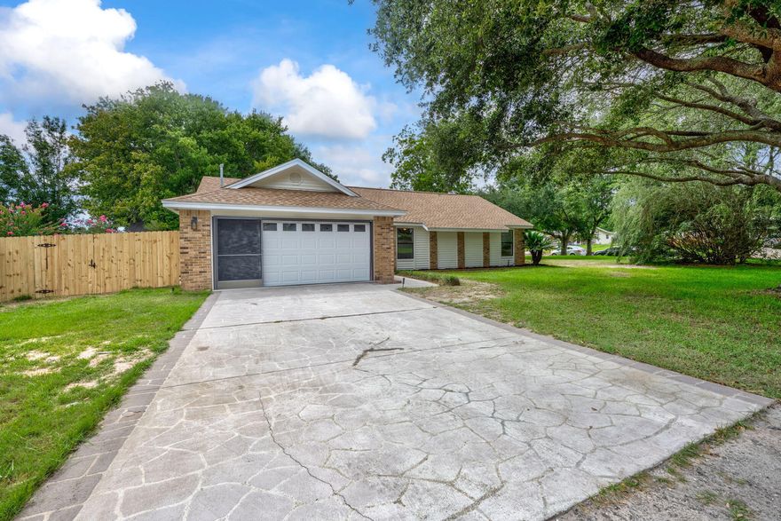 Welcome to your dream home at 122 Pryor Dr, Mary Esther! This newly renovated gem boasts 3 spacious bedrooms and 2 modern bathrooms, offering the perfect blend of comfort and style.As you pull up to the house, you'll be greeted by a charming exterior featuring a fresh new look with updated siding and a beautifully maintained front yard. The attached two-car garage provides ample parking space and convenience.Step inside to discover a bright and airy open floor plan. The living room is a highlight, featuring vaulted ceilings, a stunning white brick fireplace, and large windows that let in plenty of natural light. The freshly painted walls and brand-new LVP flooring throughout give the space a modern, cohesive feel.Adjacent to the living room is the dining area which features a lovely bay window that offers a picturesque view of the backyard. This space is perfect for enjoying meals with plenty of natural light and serene surroundings.

The kitchen is a chef's delight, equipped with all-new stainless steel appliances, sleek white cabinets, and quartz countertops. The subway tile backsplash and modern fixtures add a touch of elegance to the space. There's plenty of counter space for meal prep, and the open layout allows for easy entertaining.

The master bedroom is a private retreat, complete with plush new carpeting and an en-suite bathroom. The master bath features a large walk-in shower with stylish tile work and a modern vanity. The additional bedrooms are equally spacious and share a beautifully updated second bathroom with contemporary fixtures and finishes.

One of the standout features of this home is the large backyard. The covered patio area is perfect for outdoor dining or simply relaxing while enjoying the lush greenery. The fenced yard provides privacy and plenty of space for outdoor activities or gardening.

This home is not only beautiful but also practical, roof replaced in 2023 and HVAC system was updated 2013, ensuring peace of mind and energy efficiency.

Located in a friendly neighborhood in Mary Esther, this home offers the perfect blend of tranquility and convenience. With easy access to local amenities, schools, and parks, you'll have everything you need just a short drive away.

Don't miss the opportunity to make this stunning, move-in-ready home yours. Schedule a viewing today and experience all that 122 Pryor Dr has to offer!






