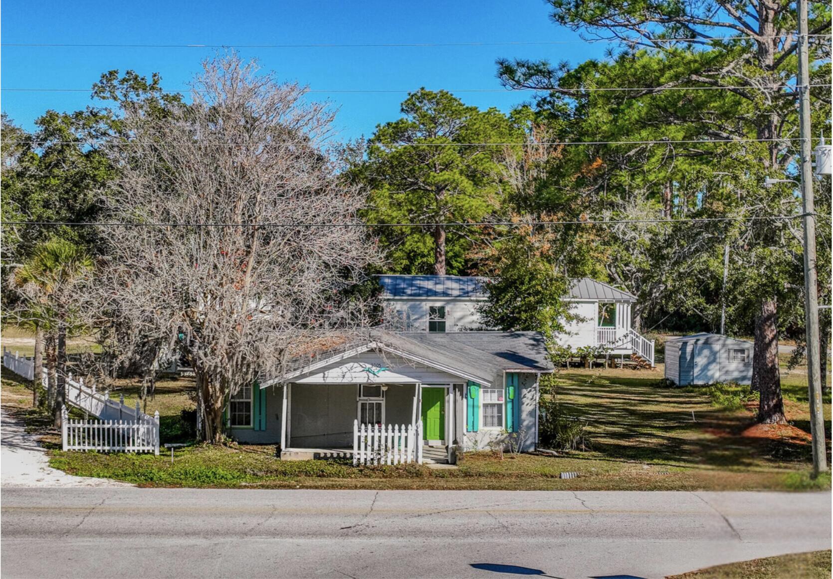 Location, Location, Location! Situated right across the street from Grady Brown Park, and minutes to the beaches and iconic 30A this charming bungalow is bursting with potential. With a spacious lot, you'll have plenty of room to make this home truly your own.Featuring 2 bedroom, 1 bathroom, this cozy yet functional layout is the perfect fixer-upper. Whether you're dreaming of creating your own peaceful retreat or seizing an amazing investment opportunity, this bungalow is your blank canvas. Enjoy relaxing afternoons on the side porch while taking in the surrounding beauty.