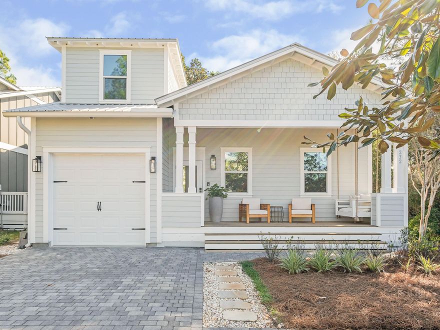 Quintessential coastal living is embodied within this fully renovated Florida Cottage, nestled within footsteps of bustling Choctawhatchee Bay. Sitting on an established, wooden lot inside the fully gated architecture diverse community of Hidden Grove, this 2,132 square-foot two level home provides a light and bright interior filled with character and luxurious details. The charming front swing porch provides a welcoming space to relax and enjoy South Walton's envious weather, while real oak flooring welcomes you within the home. Crisp painted cabinetry and a full Kitchenaid culinary space is wrapped in Calcutta quartz countertops and hand picked lighting.