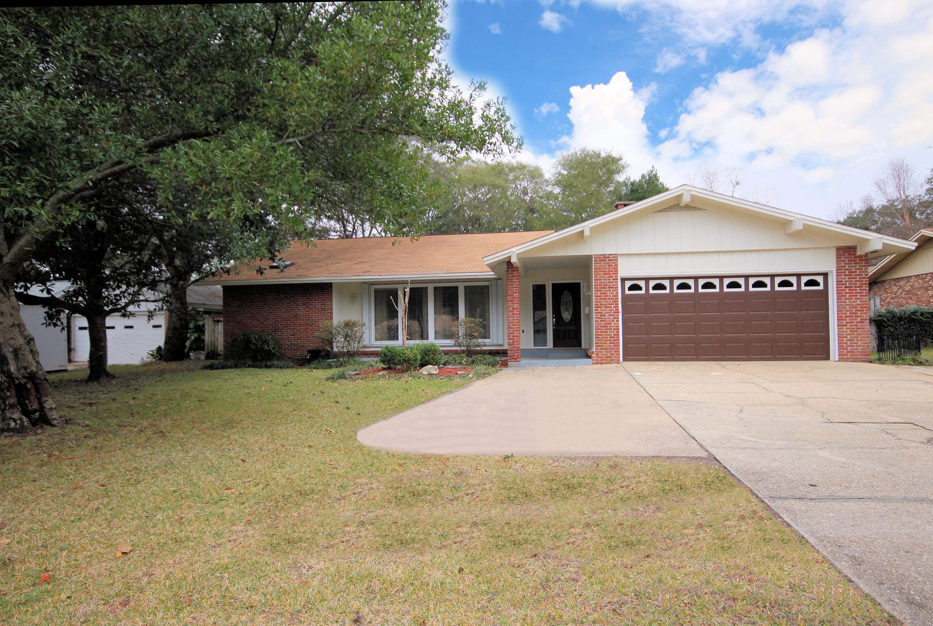 Move-in ready home with 2436 sq ft, 5 bedrooms and 2 baths in the desirable Kenwood neighborhood! The seller has maintained this home impeccably and the home is incredibly mechanically stable with all new copper wiring, updated HVAC system and duct system, roof replaced in 2005, added insulation in the attic, updated low e vinyl windows with hurricane protection on most of the windows, a central vacuum system, and a 2005 hot water heater. In addition to these upgrades, a new addition was added to the home in 2005 which includes vaulted ceilings, built-in book cases and entertainment center, and sliding glass doors to a fenced in backyard! The homeowner just painted the exterior or the home to include the front door and garage door!