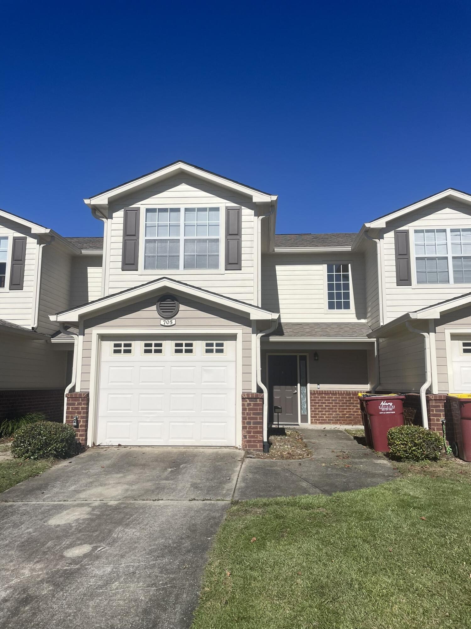 Conveniently located in south Crestview. This 3 bedroom, 2.5 bath townhome features tile flooring downstairs, with carpeted bedrooms upstairs.  Situated in Eagles Landing right across the street from the community pool and playground.