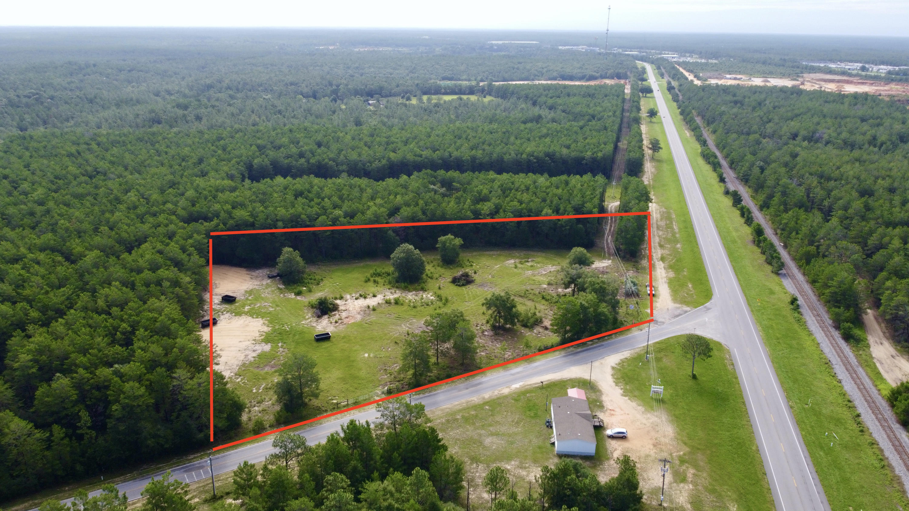 LOCATION LOCATION LOCATION!!!!! 3.9 Acres of Vacant land, Zoned for commercial. Perfect opportunity for Warehouse or Mini Storage conveniently Located Between Hwy 285 and Crestview Right off Hwy 90, Various points of access to this property From 285, I-10 and Hwy 331. In close proximity to Shoal River, various local hotels ,gas stations like Loves Travel Stop, and Store's like Lowe's Home Improvement. You don't want to miss out on this GREAT OPPORTUNITY!!