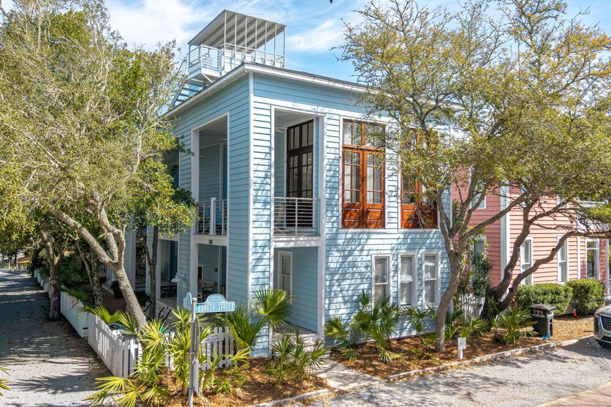 Take a Charleston-inspired home, place it in one of the most prestigious, award-winning communities along 30A, and you'll find ''Just For Fun,'' a recently renovated paradise designed for family enjoyment. Discover the ultimate in residential privacy with this rare corner lot, positioned exclusively at the quiet terminus of a dead-end street. This home offers the coveted benefits of a corner location- extra light and space- without traffic, ensuring an oasis of seclusion. Located in a premier spot across the street from the west end family pool and a quick stroll to the white sand beaches, this property offers the perfect blend of coastal luxury and convenience.Main house: Grandeur and Coastal Charm The first level of the main house features two luxurious king master bedrooms, both with en-suite baths, ensuring maximum privacy for you and your guests. The second floor reveals a grand living room defined by soaring ceilings, flooded with natural light. French doors open to a side porch, blending indoor and outdoor living spaces seamlessly. The kitchen boasts a modern vibe with new quartz countertops and high-end stainless-steel appliances, including a Viking gas range, Liebherr refrigerator, Bosch dishwasher, and built-in Sharp microwave. A newly added half bath and laundry area on this level add to the convenience. The third floor offers a third bedroom with an en-suite bath and a spacious sleeping loft kids will adore. This level also features an owner's storage room. Finally, ascend to the roof-top sun deck, followed by a covered tower, providing the perfect vantage point for spectacular sunsets and gulf views.
Guest Quarters and Outdoor Oasis
The home features attached guest quarters that can be locked off for privacy or utilized with the main house for extended family or friends. The lower level of the guest house includes a full kitchen, living/dining area, and full bath. The upper level offers a master bedroom, with full bath, a sleeping loft, and a private porch.
Just For Fun
The brick patio connects both homes, creating an ideal space for dining al fresco. Fully renovated, this home is move-in ready. Experience the best of 30A in this stunning Charleston-inspired home, where luxurious amenities meet a prime, family-friendly location. 
