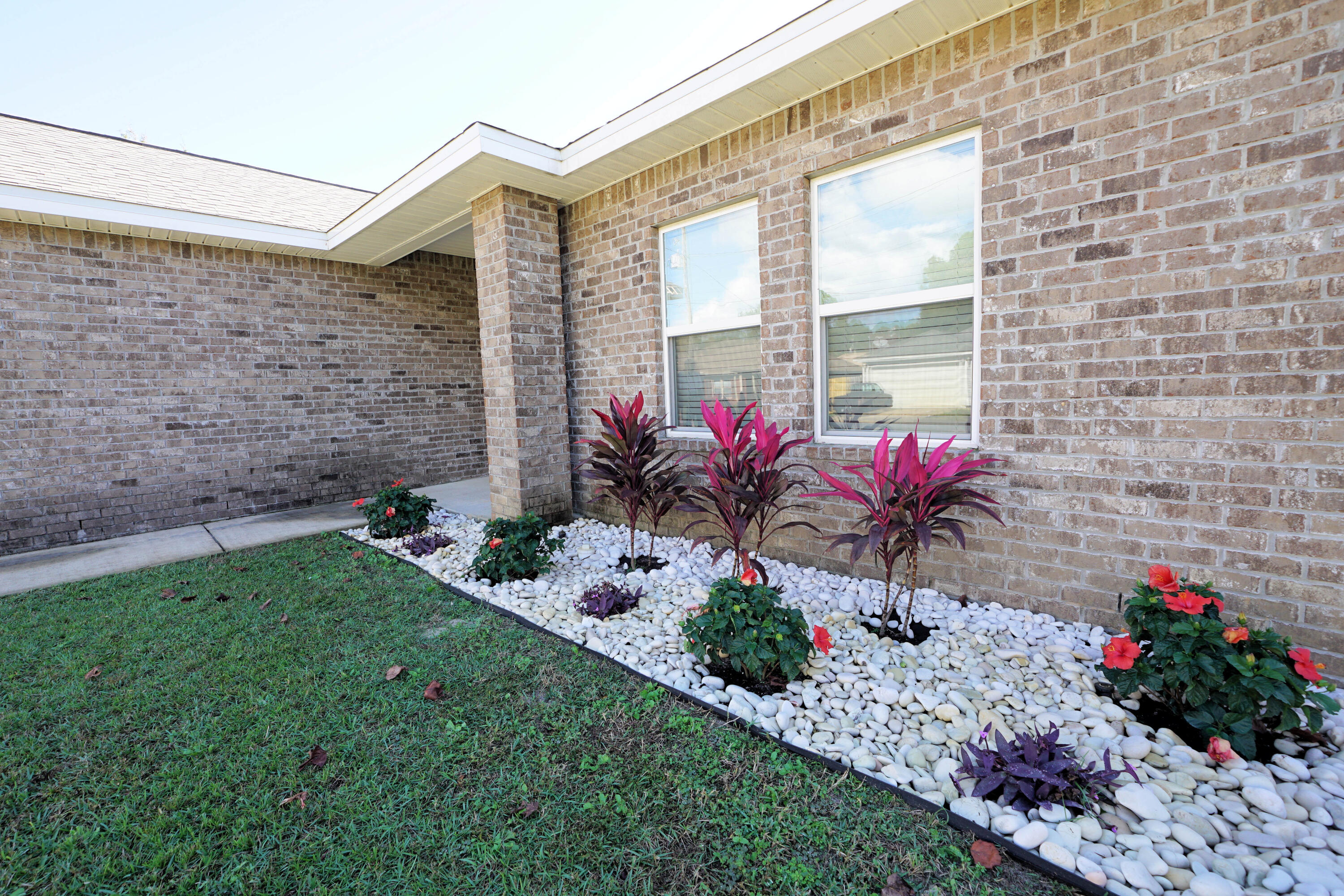 Looking for a Better Than New All Brick House close to Hurlburt Field and the Beautiful Emerald Coast Beaches? The Love and Care put into this home shows from the Curb Appeal to the Wide Open Interior Spaces with Fresh Paint throughout. The Owner's Suite features Double Vanity, Dual Shower (yes!) and 2 Walk-In Closets. The additional Bedrooms, located on the other side of home, are unusually large and feature great storage as well. The well thought out Kitchen has loads of cabinets and a Window at the SINK!! Love that. Large Laundry Room with additional Pantry space. Oversized Garage with Attic access. Covered Patio. Huge Privacy Fenced Backyard with Room for a Pool. Irrigation System for ease of Landscaping or Veggie Garden. Truly a Stand-Out place to call HOME! Must See!