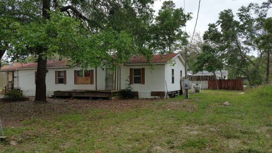 BANK OWNED-- Quarter acre lot with Mobile Home conveniently located in Santa Rosa Beach. Great opportunity to build on lot. No value in mobile home. 'Pertaining to Cash offers, the Grantee(s), or purchaser(s), of the Property cannot re-sell, record an additional conveyance document, or otherwise transfer title to the Property within 60 days following the Grantor's execution of this deed.'