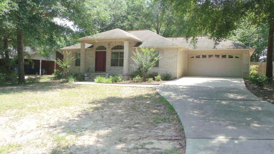 ''Home-Sweet-Home'' is what you will be saying when you see this 3 bedroom 2 bath beauty. Very well taken care of home located in North Crestview in the charming Indian Trails Estates. The subdivision has 2 fishing ponds and picnic areas for you and your family to enjoy. As you walk in you will notice the spacious living room which is ready to entertain family and friends for years to come. The split floor plan provides privacy. Tile in all the main areas & laminate in the bedrooms. Plenty of cabinet and counter space for all you cooking needs. Spacious 2 car garage allows plenty of room for your vehicles or toys. Sit on the back deck and enjoy the morning while watching the birds and squirrels play in your nature get-away backyard. Home sits on almost half acre.Won't last long!!!