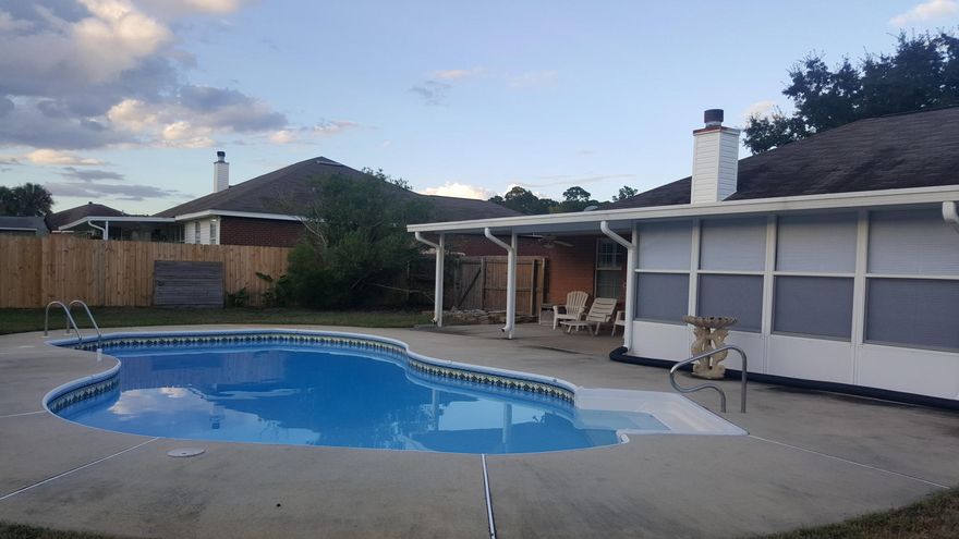 This Beautiful ''Water view'' home with an In-Ground Pool sits on a corner lot in the prestigious Lighthouse Pointe!Built 1999 with many upgrades including Granite Countertops to Kitchen, Ceramic Tile Flooring throughout- Berber carpets in bedrooms- All New SS Appliances in Kitchen- 35x16 In-ground Pool 2004 with a New Liner in 2015- Roof Ridge Vent & shingles replaced 2005- Adorable Storage Utility Work Room 2006-Rheem 67 gal Water Heater 2011- HVAC 2005- Privacy Fenced Backyard surrounding an oasis of tranquility with a covered 20x11 Patio connected to the fully Tiled, insulated, enclosed 20x11 FL Sunroom. Too many features to see! Master BDR has Trey Ceiling leading into xlarge Master BTH- also has own private sliding entrance to FL Sunroom. Vaulted Ceilings in Family Room & Dining.