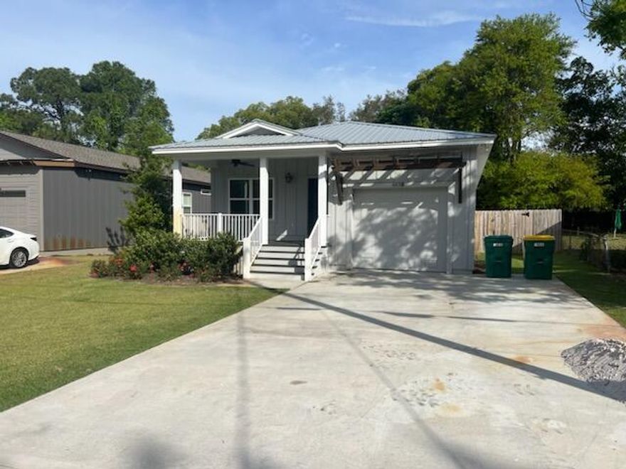 Rare like new 4 bedroom 3 bath home in Old Destin, Maintenance free aluminum and Hardy Board siding with a metal roof. Built in 2022 home boasts Vinyl flooring through out as well as Granite counter tops in the Kitchen and all three bathrooms and tankless water heater..Master bedroom has two walk in closets and double sinks. There is a stand alone utility  closet for washer and dryer in the hallway with a custom barn door.The fenced back yard includes a covered patio and dedicated grilling area with natural gas.Custom built storage areas in the garage as well. Two covered porches, 2X6 interior framing, LVP floors and Marble shower pans. Home is near Destin Elementary and Joe's Bayou. In an EA8 Flood zone but home was built with a FFE of 9' feet so flood insurance is not required.