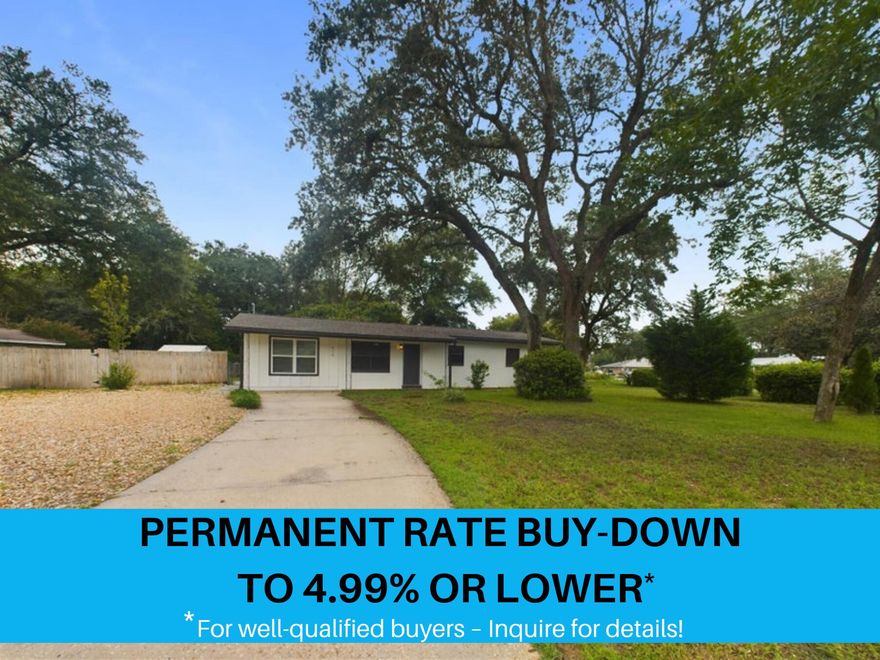 Enjoy lower payments with a 4.99% interest rate! The seller is willing to do a permanent rate buy down to 4.99% or lower for well qualified buyers. Call for more details! Be sure to check out the 3D Tour. This stunning home has been meticulously remodeled this year from top to bottom, including all the major systems, blending modern elegance with classic charm. Situated on a spacious lot, this 4-bedroom, 2-bathroom home features a layout designed for comfortable living. The heart of the home is a stylish Galley Kitchen featuring sleek white cabinets, granite countertops, and a chic backsplash, all complemented by stainless steel appliances. Adjacent to the kitchen is a versatile living area, perfect for a cozy reading nook or home office. The open family room is ideal for gatherings and entertaining. Throughout the home, modern flooring enhances the contemporary feel, while the convenient mudroom keeps your home organized. The primary bedroom boasts an en-suite bathroom with a luxurious shower, and the three additional bedrooms offer plenty of space for family or guests. Outside, enjoy the privacy of a large fenced yard, perfect for outdoor activities and relaxation. A huge shed in the back provides ample storage or can be transformed into a workshop. No HOA and a double gate? Bring your boat and RV!! Don't miss the opportunity to make this beautifully renovated house your new home! Contact us today for a showing!