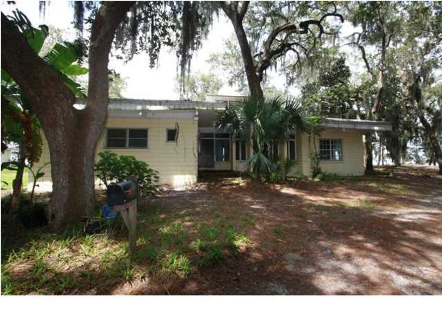375' of Bay front property on chat holly road. 5.70 acres...Great Fixer Upper !