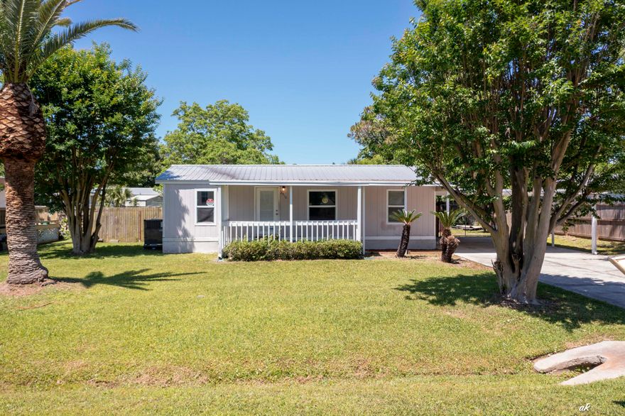 North Lagoon Oaks has long been sought-after as one of the premium neighborhoods on the Emerald Coast. There is no where on the Beach where you can find a home with 3 bedrooms / 2 bathrooms under $200,000 with quick access to the Gulf. This double wide manufactured home could be yours for an absolute deal! Brand new HVAC with all new duct work. Brand new hot water heater. Plumbing is all brand new with pex piping. Affordable living awaits you in this quaint and cozy home. Immaculately maintained and the perfect beach getaway, be prepared to awe your family and friends with a beautiful deck that spans the front of the home and a two car carport on the right hand side of the property for added convenience. Open, airy, and spacious, the living space provides ultimate comfort for entertaining. The lot boasts close to a quarter acre with beautiful sago palms. There is a fenced in back yard for pets (if you desire) and a storage shed for lawn and gardening equipment. Just minutes to the beach and great restaurants, this home is convenient to shopping and relaxation. This neighborhood is served by Patronis Elementary School, a Bay District elementary school. The location of this home is ''choice'' as you have quick access to North Lagoon Drive, Thomas Drive, and Front Beach Road, all less than a 3 minute drive. This home can be yours today, so cash in on one of the lowest priced, but most superbly maintained homes in Panama City Beach.