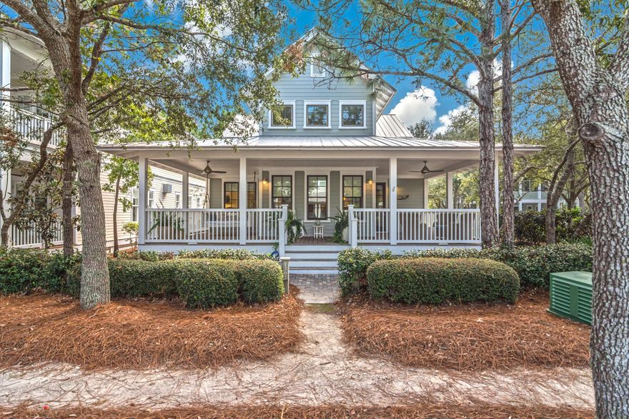 A gracious front porch welcome you to this classic WaterColor Beach Cottage.  This home boasts a large Carriage House with a spacious two-car, enclosed garage with sufficient parking for family gatherings.  Located on a corner lot and across the street a community park, this home is just a short stroll to the recently renovated Camp WaterColor.  This 4-bedroom 4-bath beach cottage has an open living area and is flooded with natural light. All floors are hardwood with tile flooring in the bathrooms. The oversized rear screen porch connects the two-car garage to the main house. Owners have added a full outdoor kitchen and bar area.  The carriage house has a sitting area, a full kitchen, bathroom and washer and dryer. This one will not last long.  Call today to schedule your private showing.
