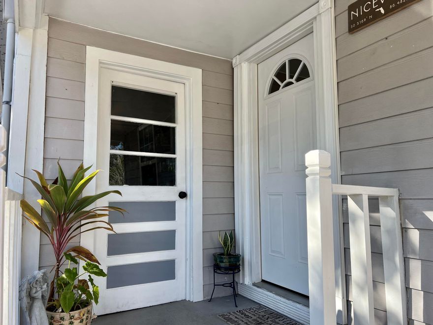 Charming remodeled Florida cottage with modern updates.  Discover this adorable home full of charm and character.  Conveniently located just under a mile to parks, schools (middle, high, college), and more, this home offers both comfort and accessibility.  The property has been thoughtfully remodeled and is move-in ready!  Highlights include: Kitchen remodeled (2021) New cabinets, countertops, backsplash, refrigerator and stove.  Electrical updated from previous owners.  New AC system 2023. New shower in 2024 in Master bathroom and updated guest bath. New roof 12/2024 to ensure peace of mind for years to come. Additional features hardwood floors throughout most of the home, fenced in backyard, workshop with carport, AC and a 30amp for your RV and plenty of parking. This home is a true gem