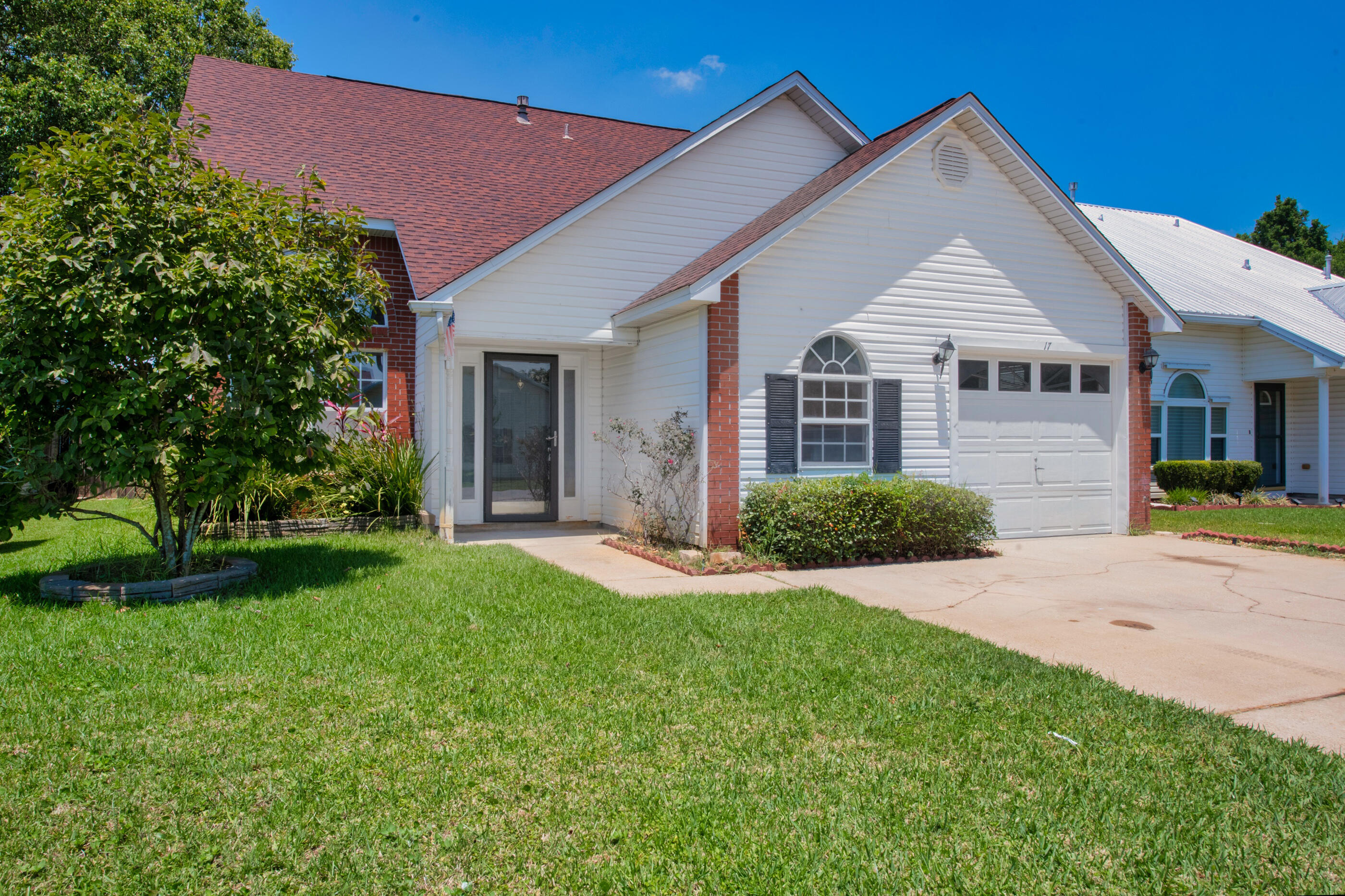 Welcome to your new home in Emerald Estates! This tastefully updated home is centrally located in Mary Esther close to Hurburt Field, Santa Rosa Mall, and with quick access to the beaches and shopping. As you enter into your new home, you'll notice high vaulted ceilings that make the living room feel open and airy with lots of natural light. To the right you have a large office/ den with access to your 1-car garage. As you continue into the house, you'll notice the staircase that leads up to your 3 large bedrooms and full bath. Continue walking to the back of the house, and you'll see to the right another hallway where you'll find your large half-bath and further down the hallway your 1st-floor master bedroom. This room features a large walk-in closet and a sizable master bath. Head back