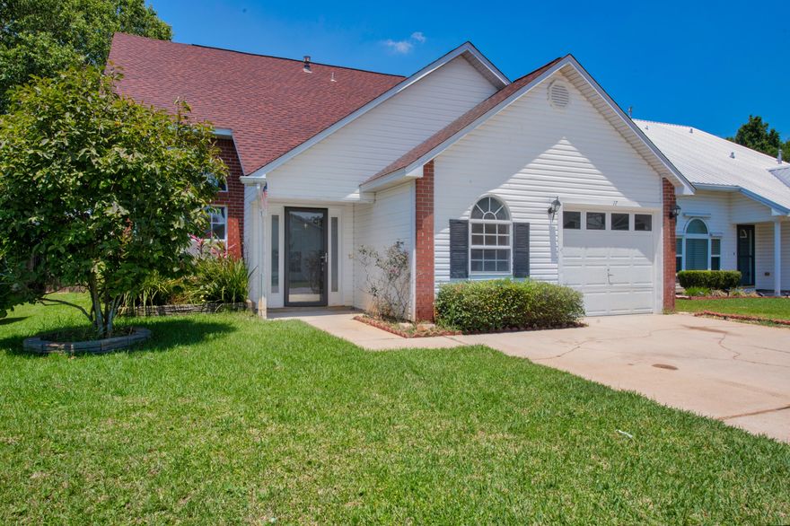 Welcome to your new home in Emerald Estates! This tastefully updated home is centrally located in Mary Esther close to Hurburt Field, Santa Rosa Mall, and with quick access to the beaches and shopping. As you enter into your new home, you'll notice high vaulted ceilings that make the living room feel open and airy with lots of natural light. To the right you have a large office/ den with access to your 1-car garage. As you continue into the house, you'll notice the staircase that leads up to your 3 large bedrooms and full bath. Continue walking to the back of the house, and you'll see to the right another hallway where you'll find your large half-bath and further down the hallway your 1st-floor master bedroom. This room features a large walk-in closet and a sizable master bath. Head back