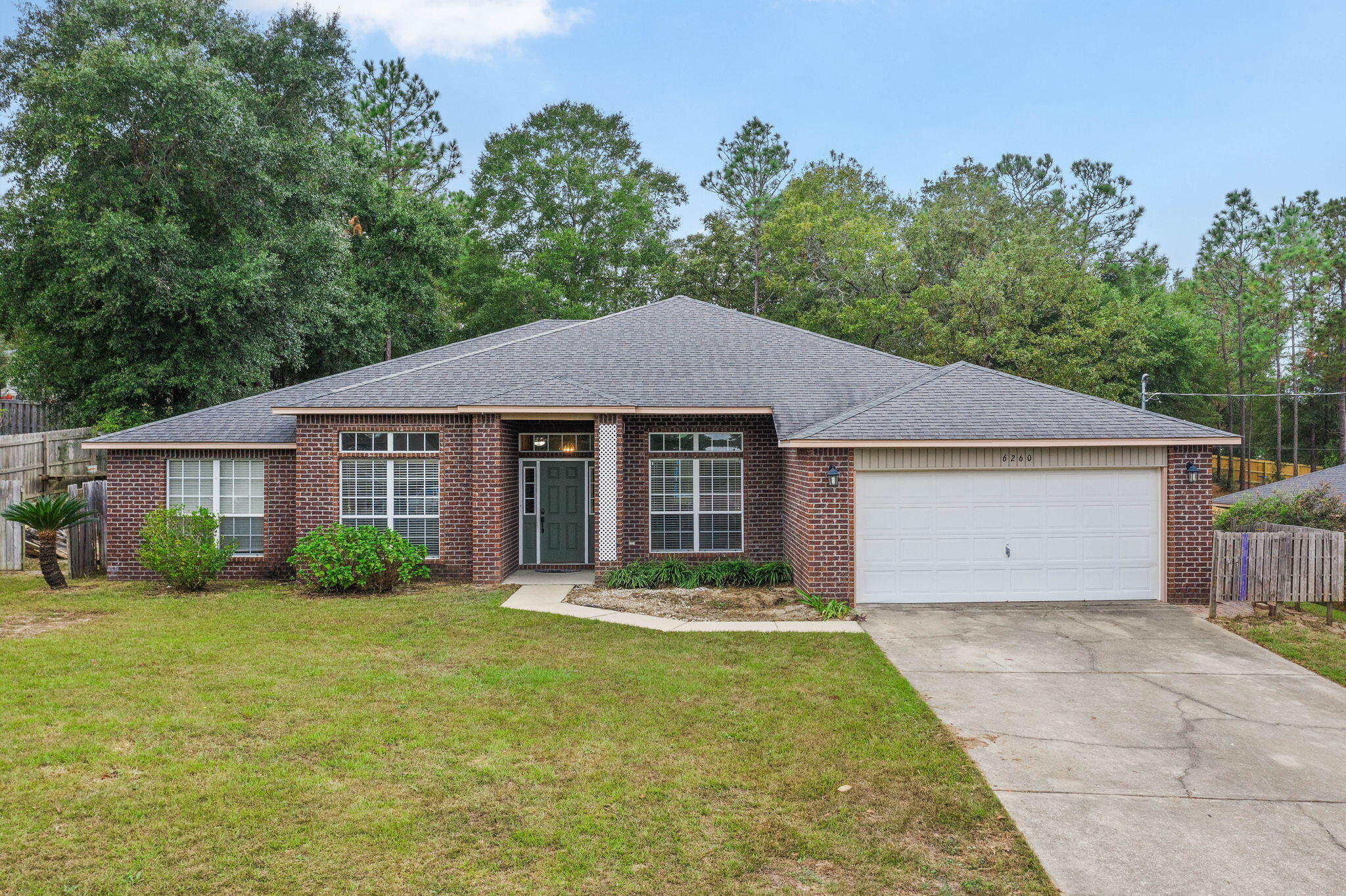 Welcome to 6260 Bullett Drive, a Beautiful home located in Silver Springs Estates. Built in 2011, this 4 Bedroom 3 Bath home combines all the modern comforts and the perfect floorplan design. With Once you step inside the large grand foyer you will be greeted with a the Natural Lights. Sitting off the foyer to the left there is an office (or a 5th bedroom with no closet) or to the right there is a formal dining room. Perfect for the entertaining your holiday dinners. Once you enter the Huge Living room you will have a Light Bright and Airy Feeling. The Floorplan has an Open feeling which is wonderful for entertaining or enjoying your family time. The Open kitchen is perfect for the chef in you! The center island is the perfect place to make cookies or crafts with the kids. The Kitchen boasts stainless steel appliances, an island bar, upgraded wood cabinets, granite countertops and lots of cabinet space with modern amenities designed for culinary enthusiasts as well as a walk in pantry. The split bedroom plan gives you the privacy you need with all the bells and whistle in the master bathrooms. The master bathroom features  a double vanity,  a separate shower stall, a garden tub for a sense of indulgence. The master bedroom has a door leading to the covered porch and backyard views. The 4th bedroom can double as a secondary master bedroom, with its own private bathroom. There is also a door leading to the backyard which can be used in the future as a cabana bathroom if you decide to add a pool. Envision sipping your morning coffee in the 26x11 covered porch, or hosting unforgettable gatherings in the spacious backyard, or sitting around a firepit in the fall or winter months sipping hot chocolate and roasting marshmallows with the kids. This property is fenced giving you the privacy you need or space for your pets to play! There are endless possibilities for you here at 6260 Bullet Drive. So call your favorite Realtor or call us today for your personal showing!!