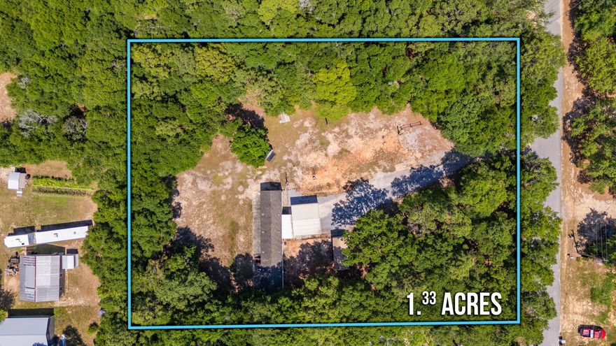 Discover the perfect blend of comfort and flexibility with this 1.33-acre property spanning two separate lots--one improved with a newer, well-maintained mobile home, and the other is vacant, but equipped with its own septic system and power pole, offering endless possibilities for future use or building your own dream home while living in the mobile home. As you step inside the mobile home to find vinyl floors throughout the main living areas, like-new carpet in the bedrooms, and a well-kept interior. The primary bathroom features a relaxing deep soaking tub, and a double vanity for relaxation, offering a touch of luxury. Outside, enjoy an insulated cover deck with an outdoor proof ceiling fan and light fixture. The aluminum rails are there for an added sense of security. enjoy a spacious carport, a brown storage shed, and plenty of room to stretch out. Need space for your RV, boat, 4-wheelers, or trailers? You've got it here. There's no HOA, and plenty of cleared land to park and play. Live on one lot and build on the other, bring the toys, or invest and rent. The options are yours!