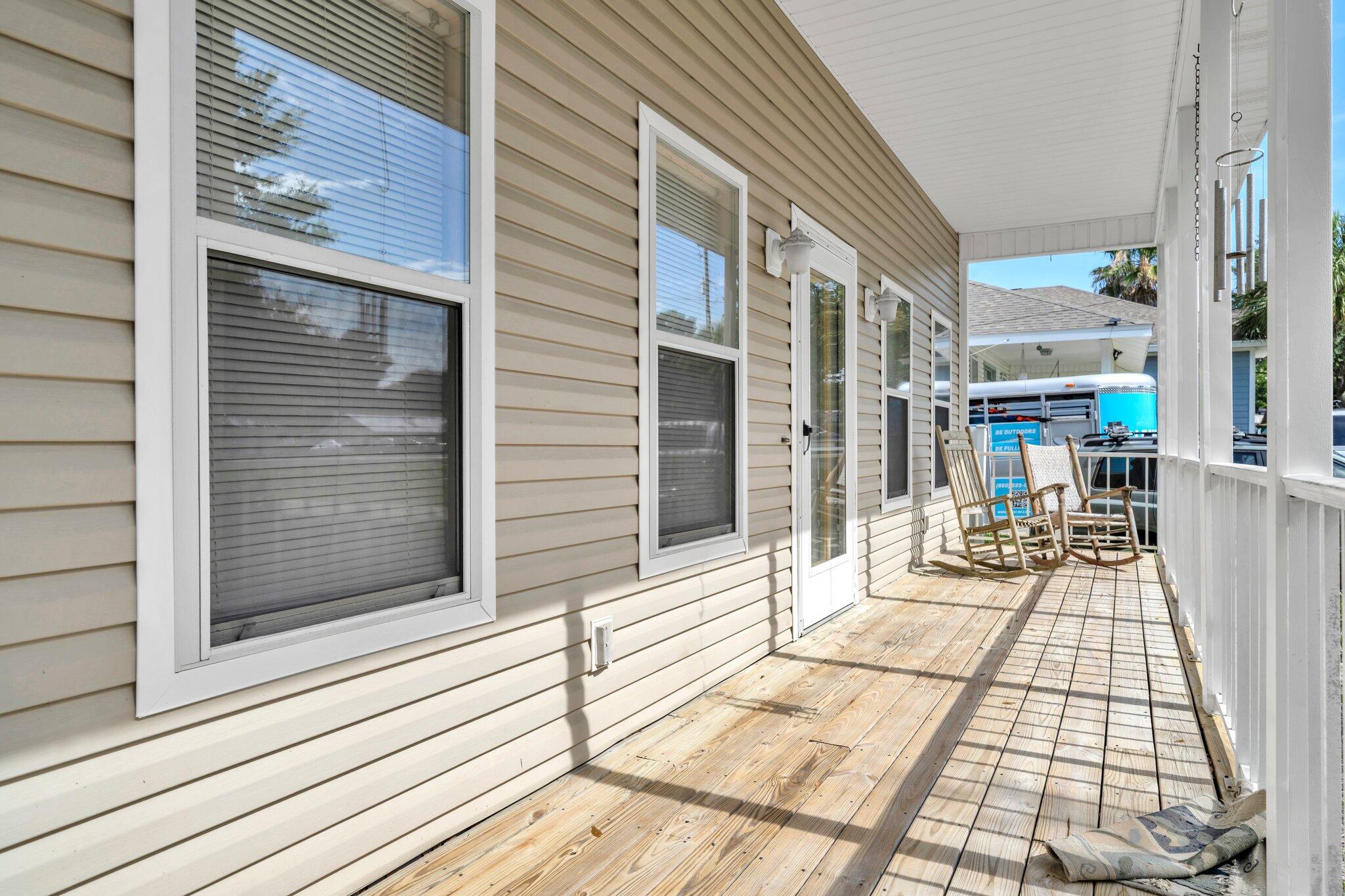 Charming Florida cottage in the very heart of Downtown Destin, featuring a full front porch (nice for rocking chairs and watching the world go by!), a screened in back porch, and the perfect size back yard for barbeques or gardening enthusiasts. The first level has two bdrms with ensuite bathrooms, cozy living rm, kitchen, dining area, & laundry rm. Upstairs is the 3rd bdrm, bath,& sitting room. Ample storage areas upstairs w/easy attic access. The property location is so convenient to numerous shopping areas ,restaurants, the New Publix, beaches, churches, and other area attractions! Great property for new buyers, families, or savy investors. There is also a vacant lot next door which can be purchased together with this home or separately.... creating numerous investment opportunities.