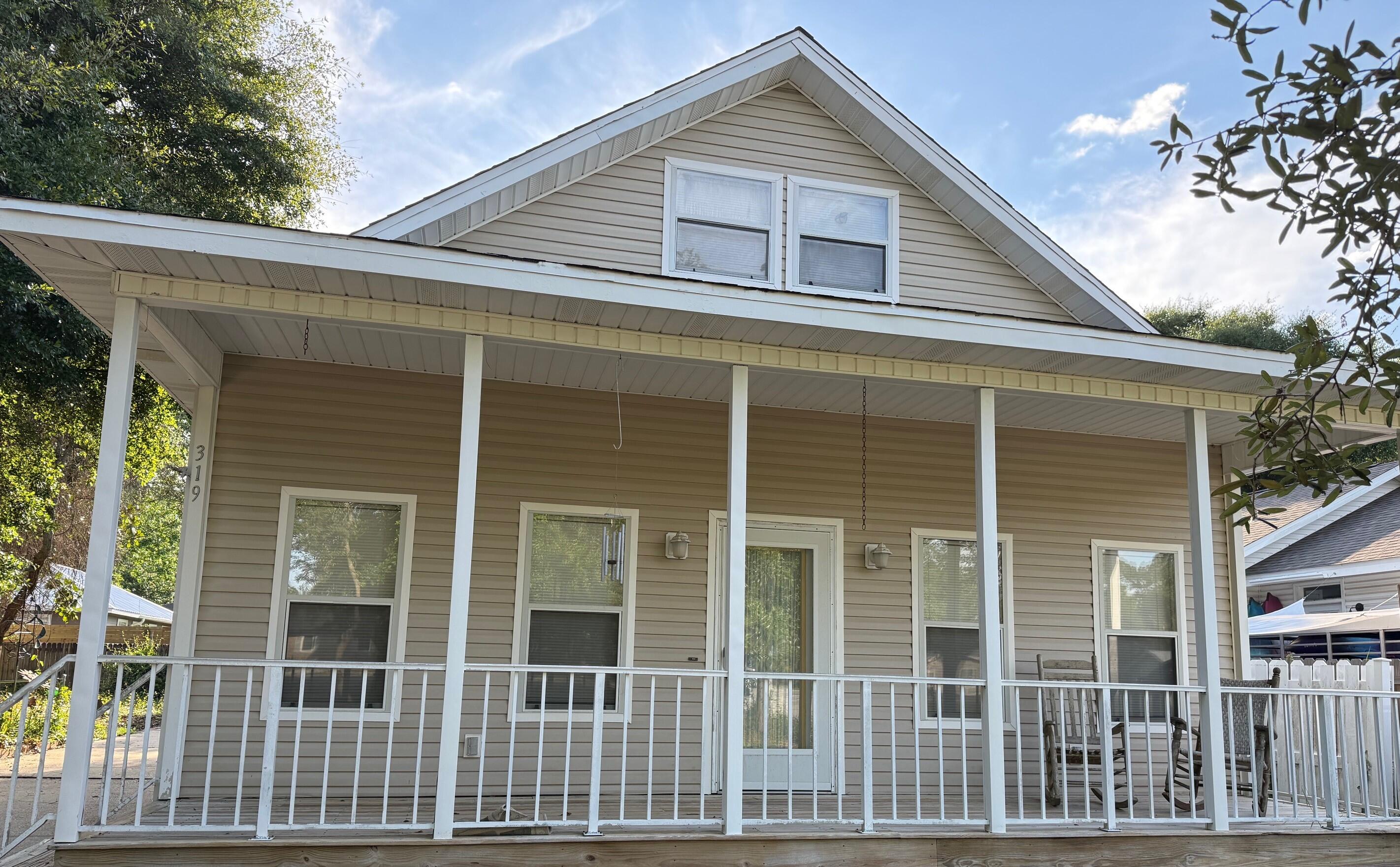 Charming Florida cottage in the very heart of Downtown Destin, featuring a full front porch (nice for rocking chairs and watching the world go by!), a screened in back porch, and the perfect size back yard for barbeques or gardening enthusiasts. The first level has two bdrms with ensuite bathrooms, cozy living rm, kitchen, dining area, & laundry rm. Upstairs is the 3rd bdrm, bath,& sitting room. Ample storage areas upstairs w/easy attic access. The property location is so convenient to numerous shopping areas ,restaurants, the New Publix, beaches, churches, and other area attractions! Great property for new buyers, families, or savy investors. There is also a vacant lot next door which can be purchased together with this home or separately.... creating numerous investment opportunities.