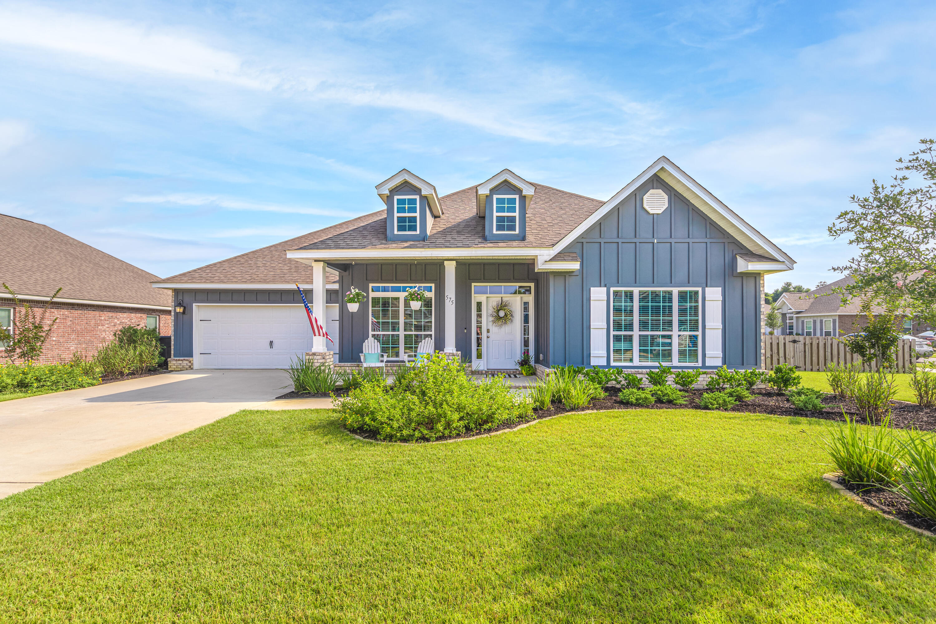 OPEN HOUSE on Sunday, August 8 from 12:00 - 3:00 p.m. Meticulously maintained home in the highly sought-after Central Park neighborhood of Hammock Bay! This beautifully upgraded 5 bedroom, 3 bath single story 'McKenzie' model is ready for you to call home. No detail has been overlooked. Over 3000 square feet of heated and cooled comfort boasting an open floorplan complete with a dedicated office and formal dining area. The gourmet kitchen includes sprawling granite countertops, stainless steel appliances with a gas range, large walk-in pantry, and an eat-in kitchen area overlooking the GIANT living room with stunning gas fireplace and plenty of natural light. Off the living room you will find two separate wings; one to the master suite including a well-appointed ensuite