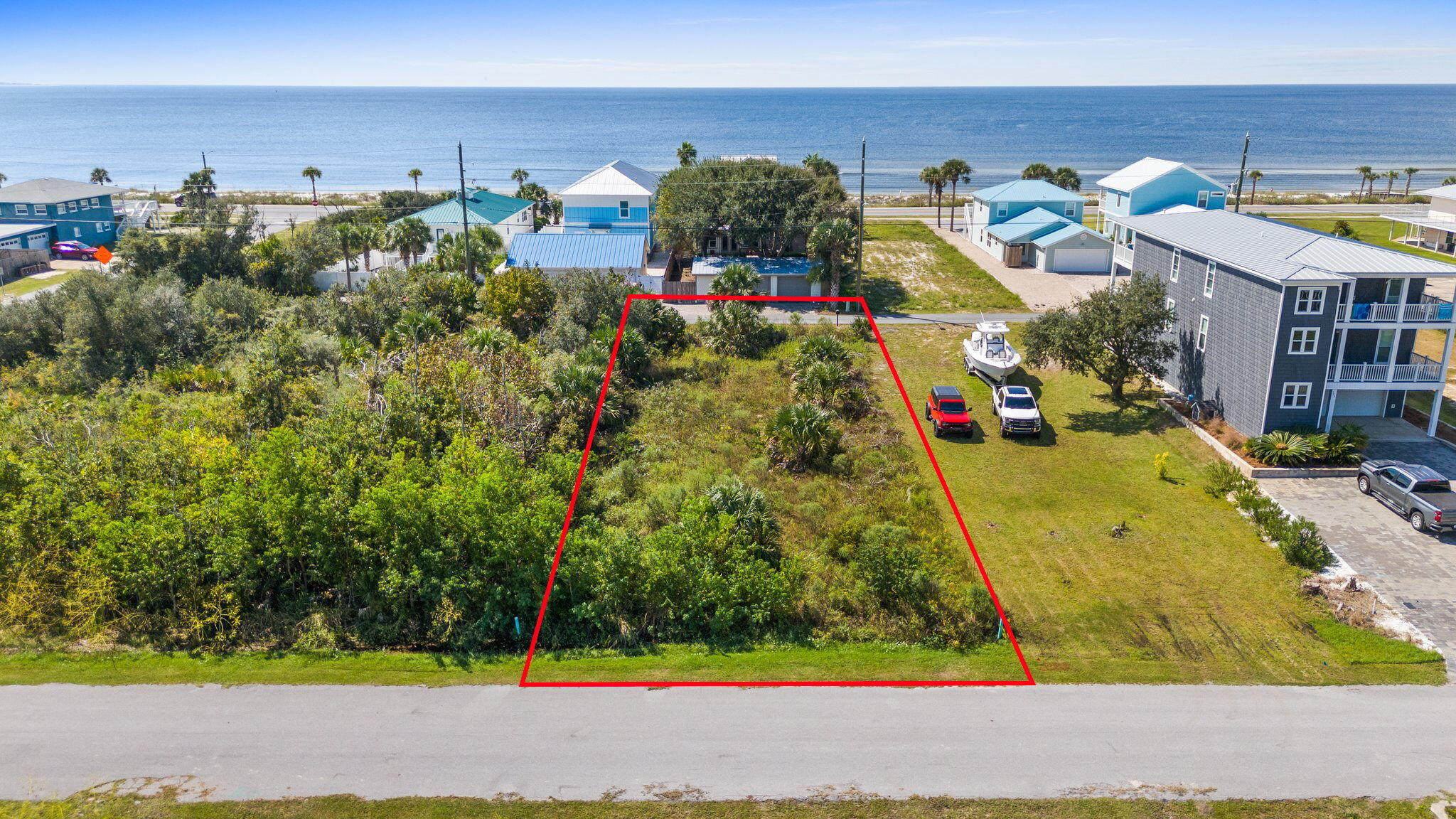 Discover the potential of 205 Fortner Avenue in Mexico Beach, FL--a prime piece of vacant land that's ready to bring your vision to life. This spacious 50x150 lot is perfectly positioned just two blocks from the breathtaking Gulf Coast beaches, offering the ideal setting for your dream home or a savvy investment venture.Nestled in a desirable location, this parcel provides ample space for designing a custom retreat or vacation rental that capitalizes on the area's natural beauty. The property is located in Flood Zone X.One of the standout features of this offering is the inclusion of building plans, making it easier than ever to kickstart your project. Whether you're envisioning a cozy beach cottage or a modern coastal escape, the possibilities are endless. Enjoy the charm and tranquility of Mexico Beach while having the convenience of local amenities nearby. With its prime location and included plans, 205 Fortner Avenue presents a unique opportunity to create something truly special. Don't miss the chance to own a piece of paradise and bring your coastal dreams to life!