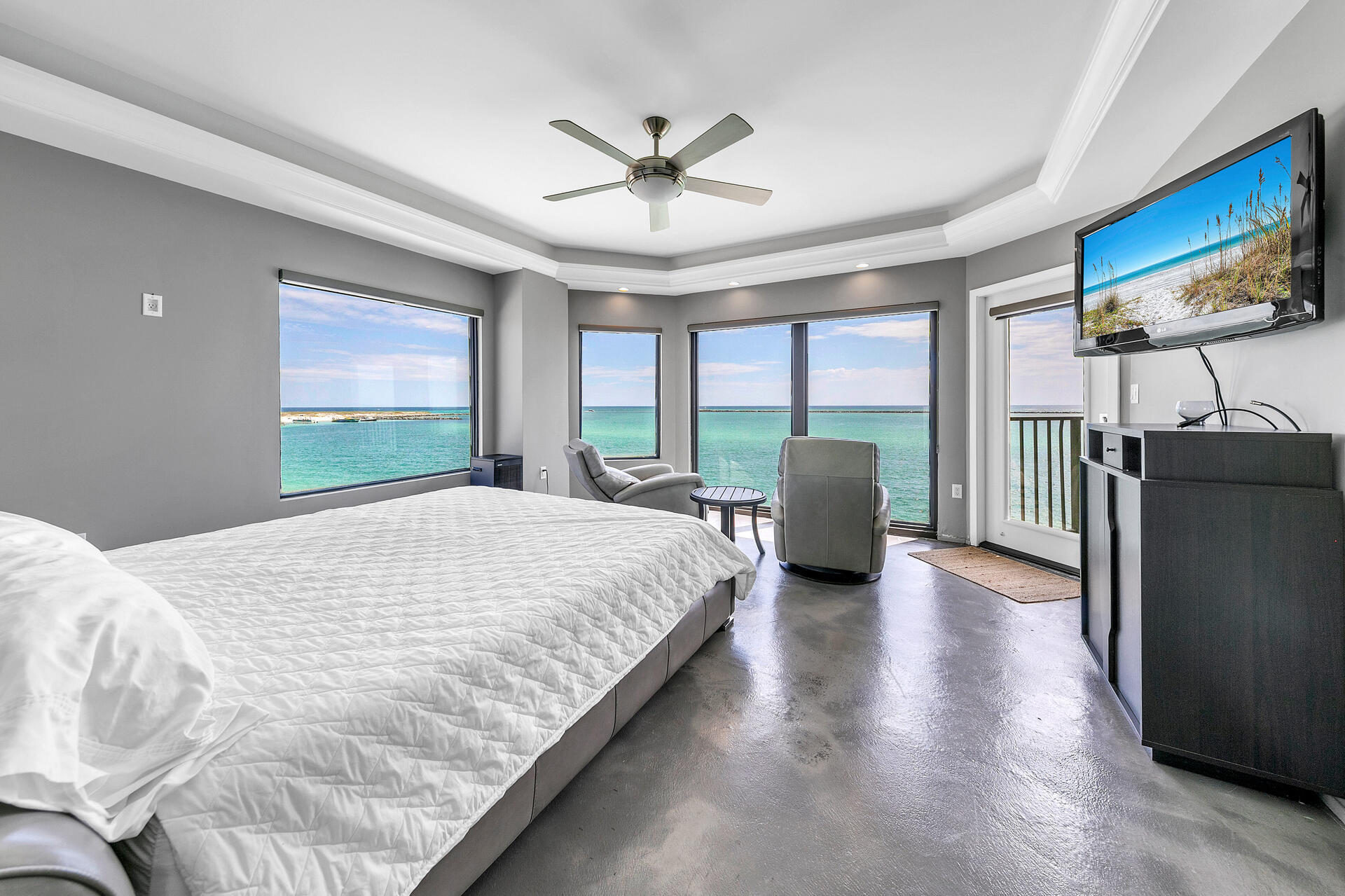 Gorgeous modern unit in the sought-after Waterview Towers Yacht Club. The views are some of the best that Destin has to offer. Every room has a view of either the Gulf/Pass or the Harbor. During the daytime watch the boats coming and going through the Pass and at night switch to the other side of the unit for the lights on the Destin Harbor. There are always fabulous views to enjoy. The unit consists of 4 bedrooms and three full Baths with high end modern finishes throughout. This unit also comes complete with covered parking in the garage and a large storage unit. Waterview Towers Yacht Club offers a pool, hot tub, owners lounge, fitness center and a marina. Boat slips do come up for sale from time to time. Complex does not allow short term rentals must be 30 day minimum.