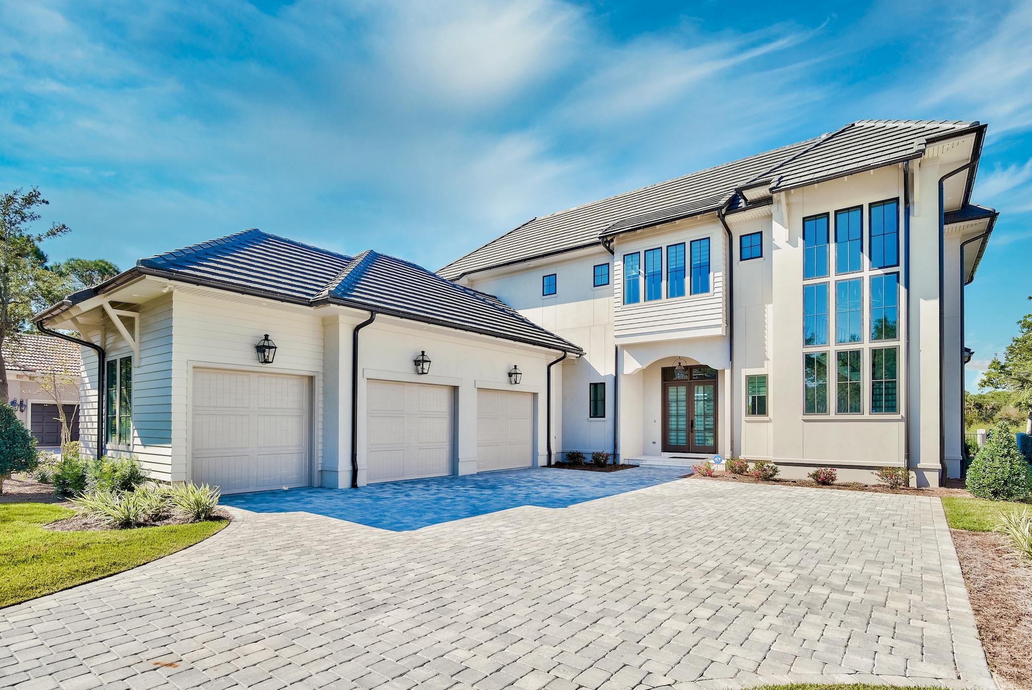 When you purchase in Regatta Bay you are purchasing more than just a home you are buying a lifestyle. Regatta Bay is located in the middle of Destin's finest shopping and activities. Leave the car at home and jump on your golf cart to enjoy shopping or dining at Destin Commons, boating at Legendary Marine or a round of golf at Regatta Bay's #1 ranked golf course. The list goes on with a short bike ride or golf cart ride to Whole Foods and several of the area's finest restaurants.This beautiful custom home is situated on both golf course and lake offering breathtaking views. Newly constructed and built by Destin Custom Home Builders who pride themselves on going above and beyond what is expected by using only the best materials and techniques such as: